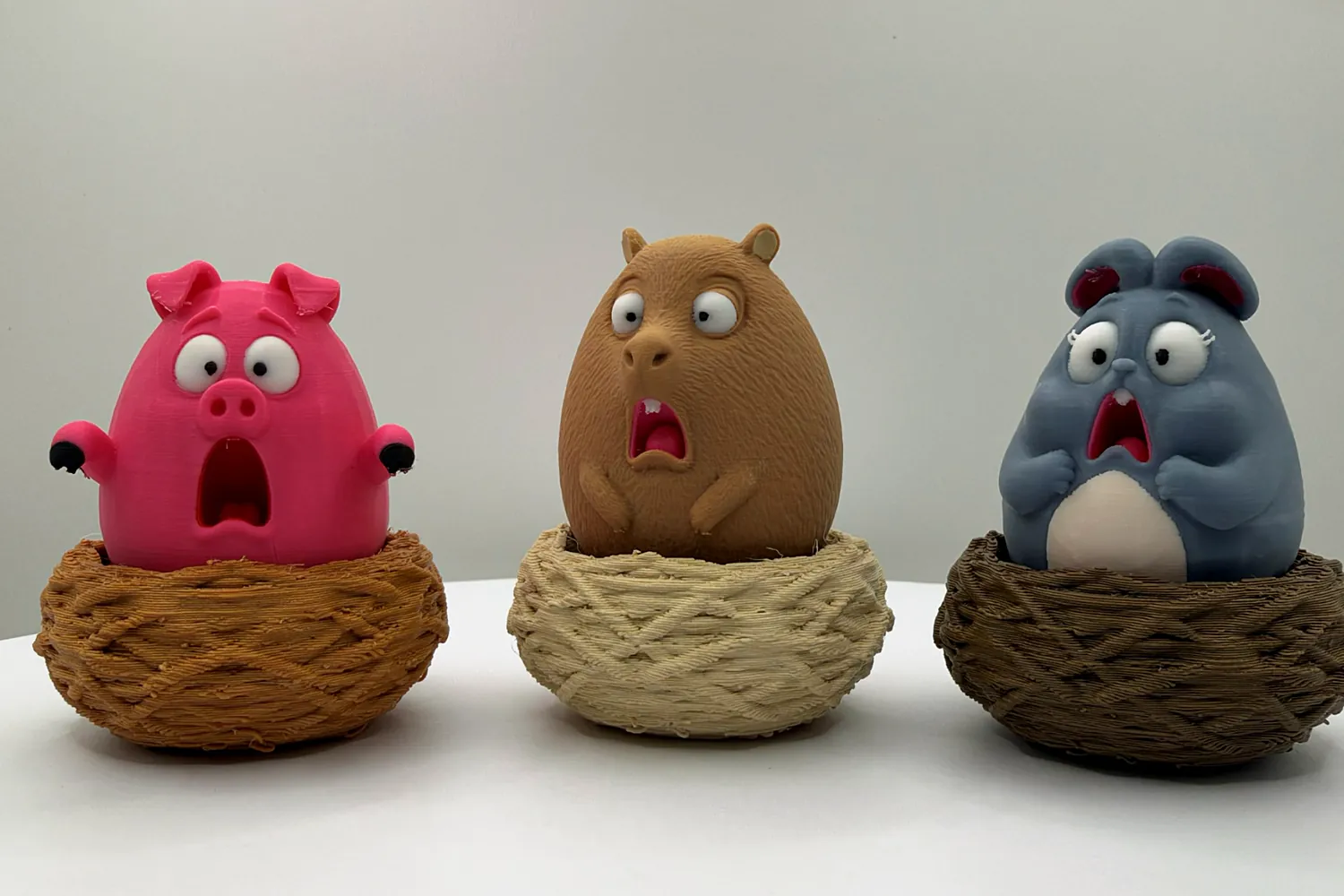 The Pig, Capybara and Rabbit Nest Clickers in a row
